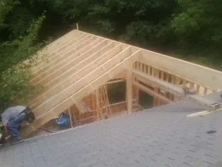 Framing a new roof addition that ties into an existing shingle roof in South Londonderry
